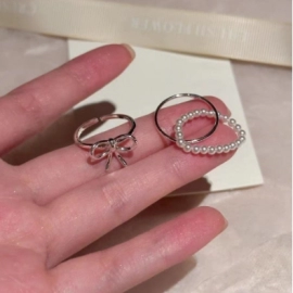 Butterfly knot pearl cross ring for women, adjustable, niche design, light luxury, high-end, layered ring Finger ring